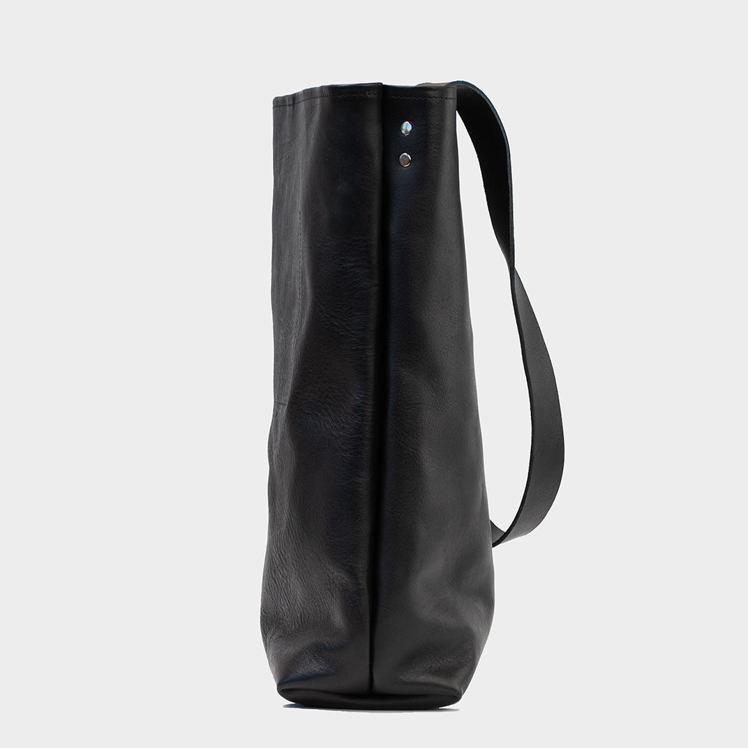 Side View of Black Leather Tote Bag