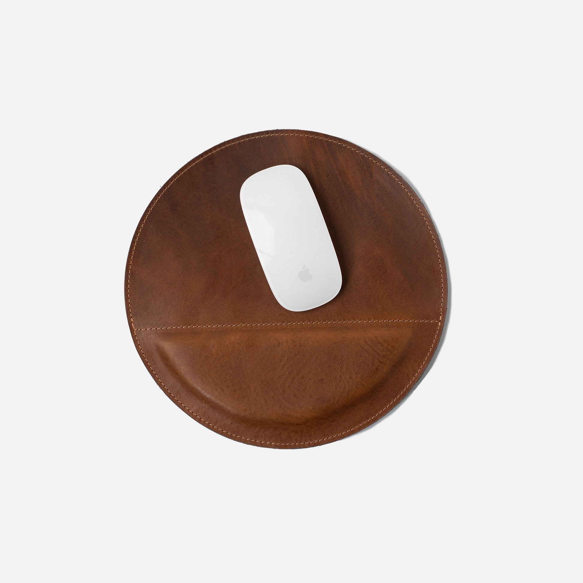 Brown full-grain leather mouse pad with padded wrist support and anti-slip base