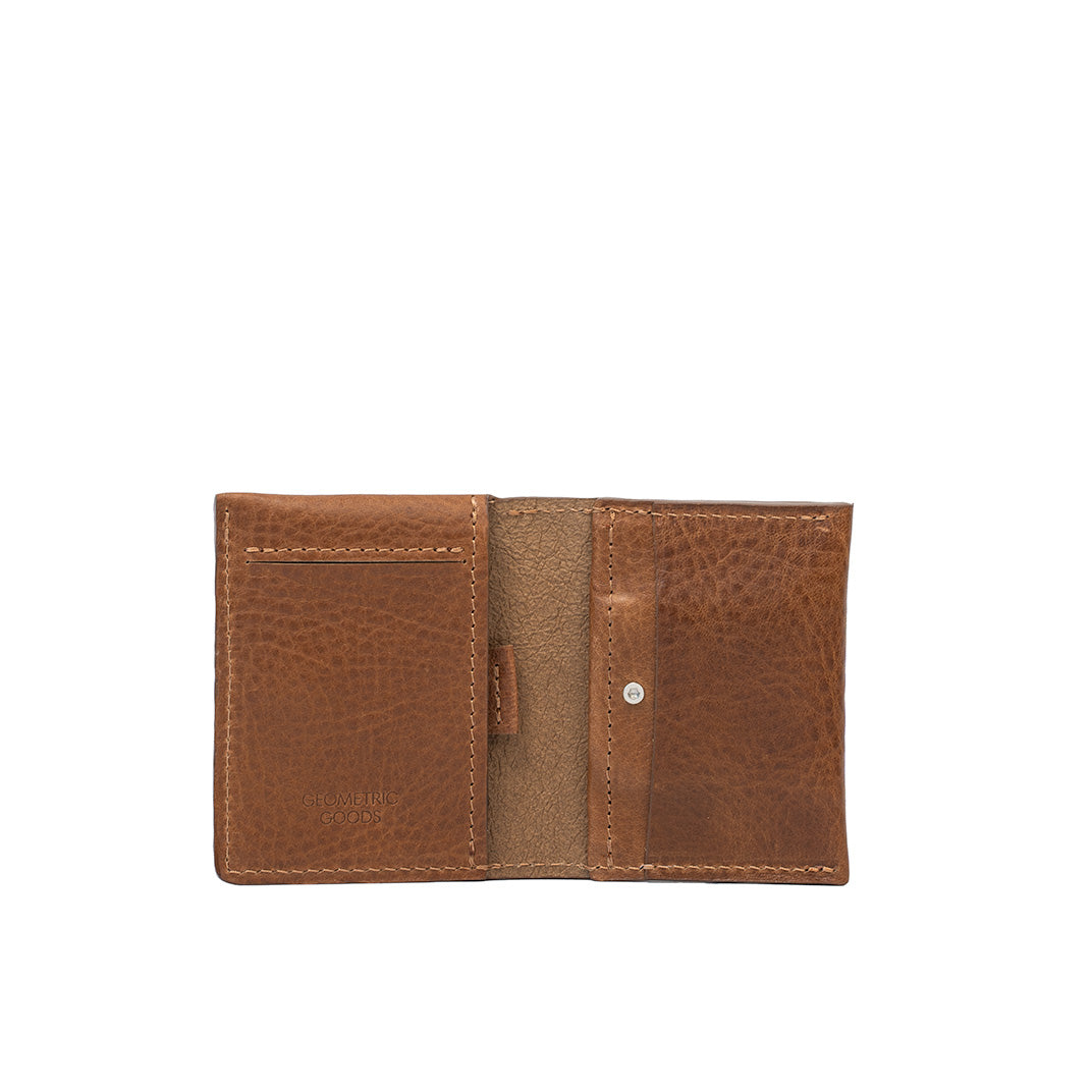 Open view of brown leather AirTag card wallet with visible card slots and compartments.