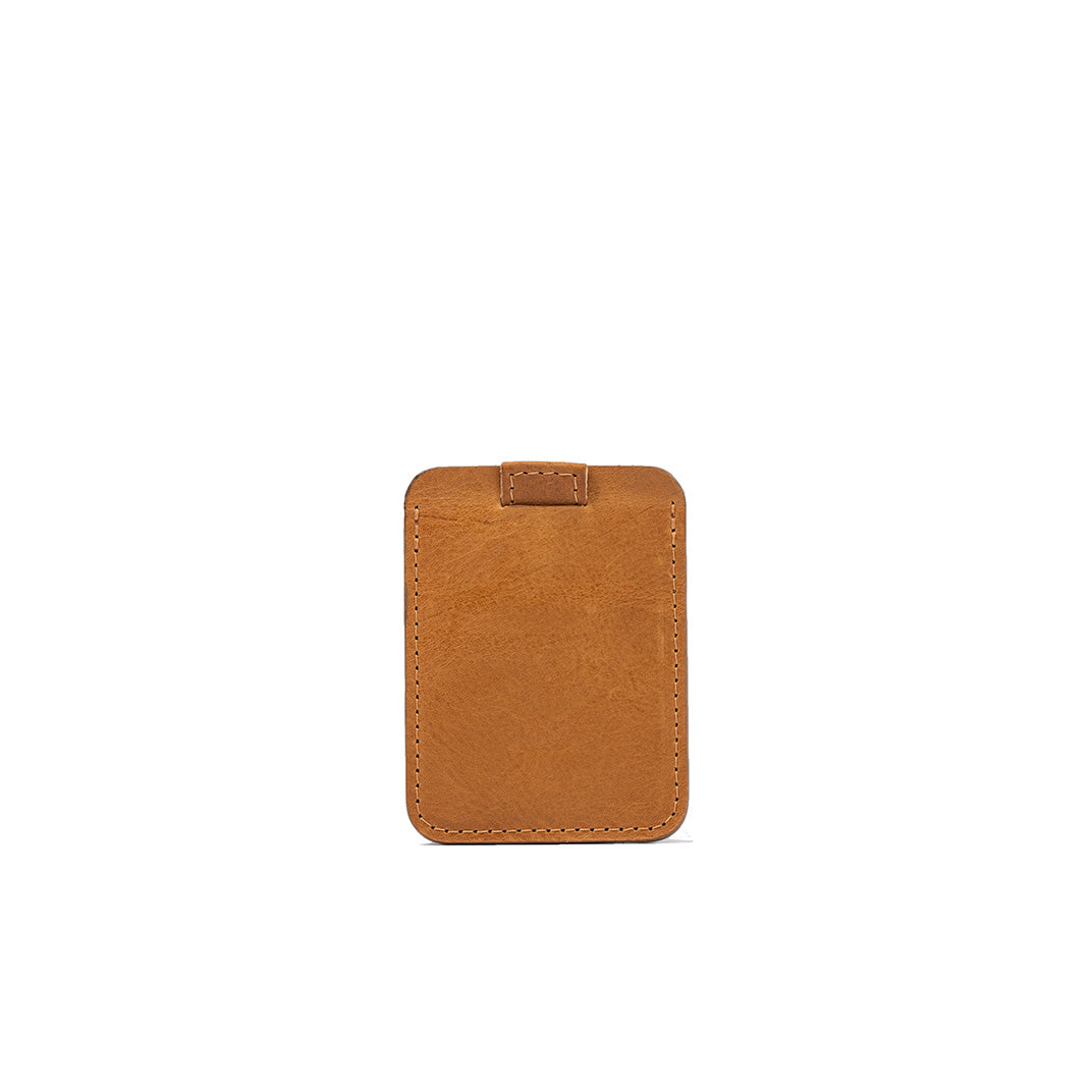 Slim minimalist camel leather cardholder with pull tab for easy access to credit cards