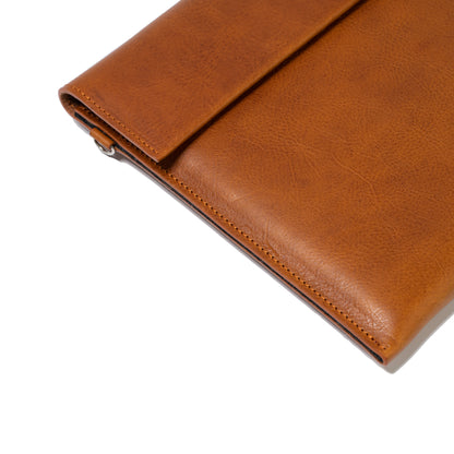 Designer mens sleeve case bag for iPad Pro in cognac brown tan color with adjustable strap made from premium Italian leather