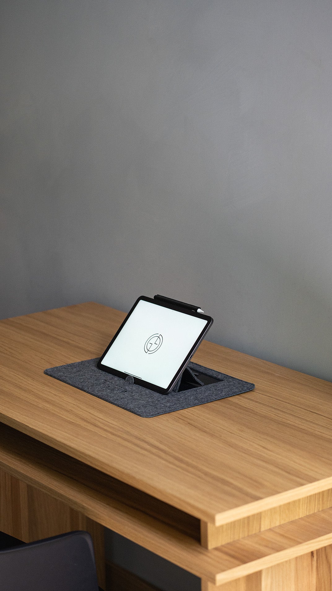 Ergonomic desktop iPad stand in grey wool felt – upright tablet holder for productivity desk setup