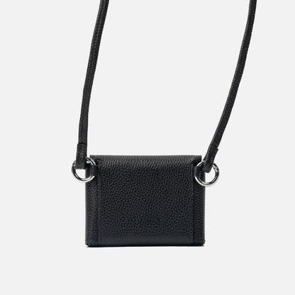 Black DUO Sleeve 1.0 in Italian pebbled leather with shoulder strap, back view