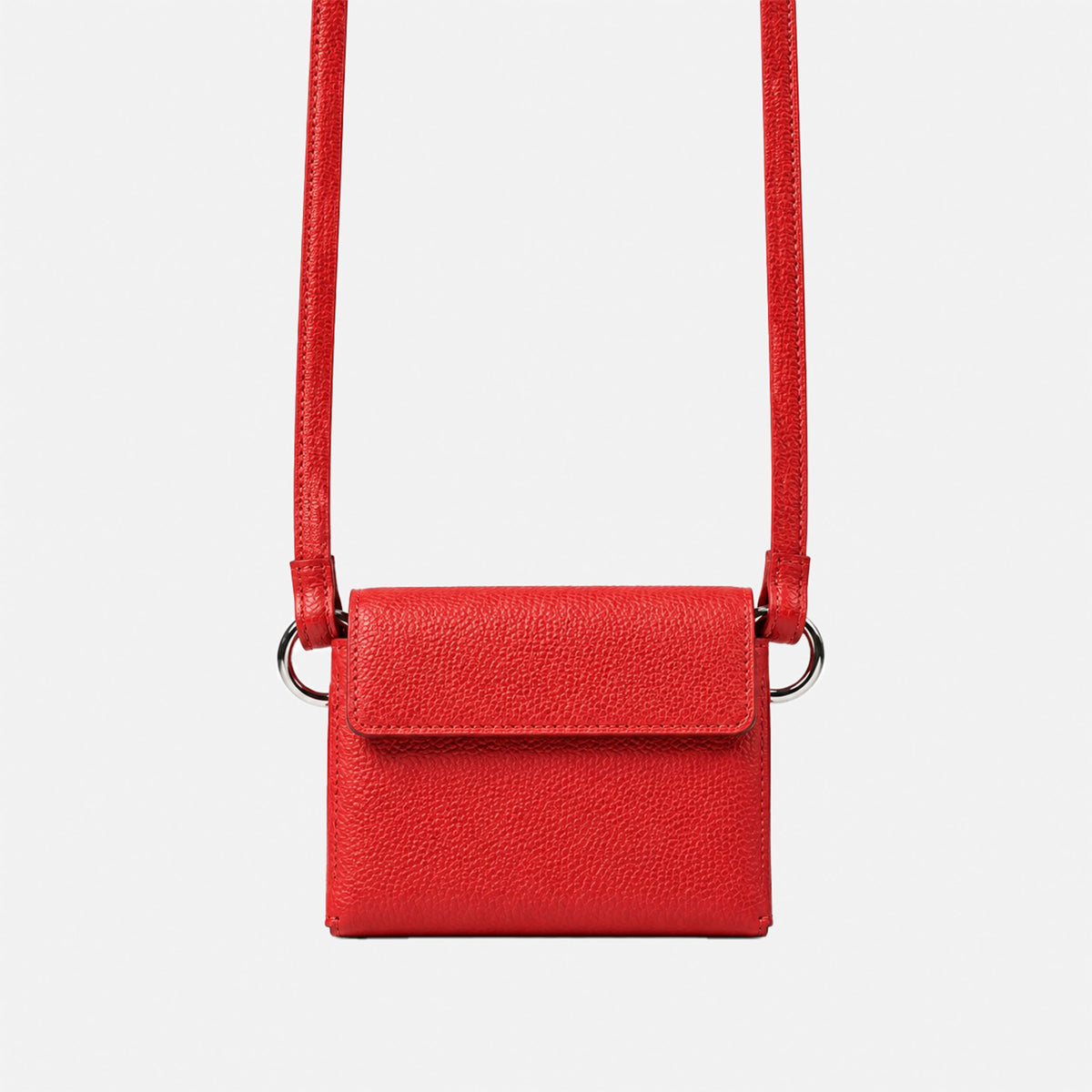 Red DUO Sleeve 1.0 in Italian pebbled leather with matching shoulder strap