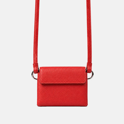Red DUO Sleeve 1.0 in Italian pebbled leather with matching shoulder strap