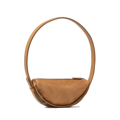 Shoulder bag designed as a half moon bag in smooth camel leather, featuring a stylish crescent bag profile perfect for everyday elegance