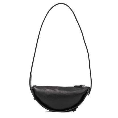 Front view of the stylish black leather crescent bag, highlighting its spacious interior and unique design