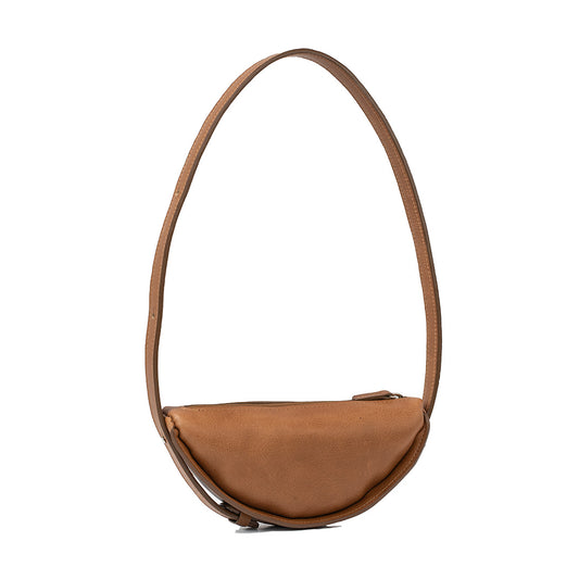 Shoulder bag styled as a half moon bag in smooth brown leather, exemplifying the elegant crescent bag design for versatile use