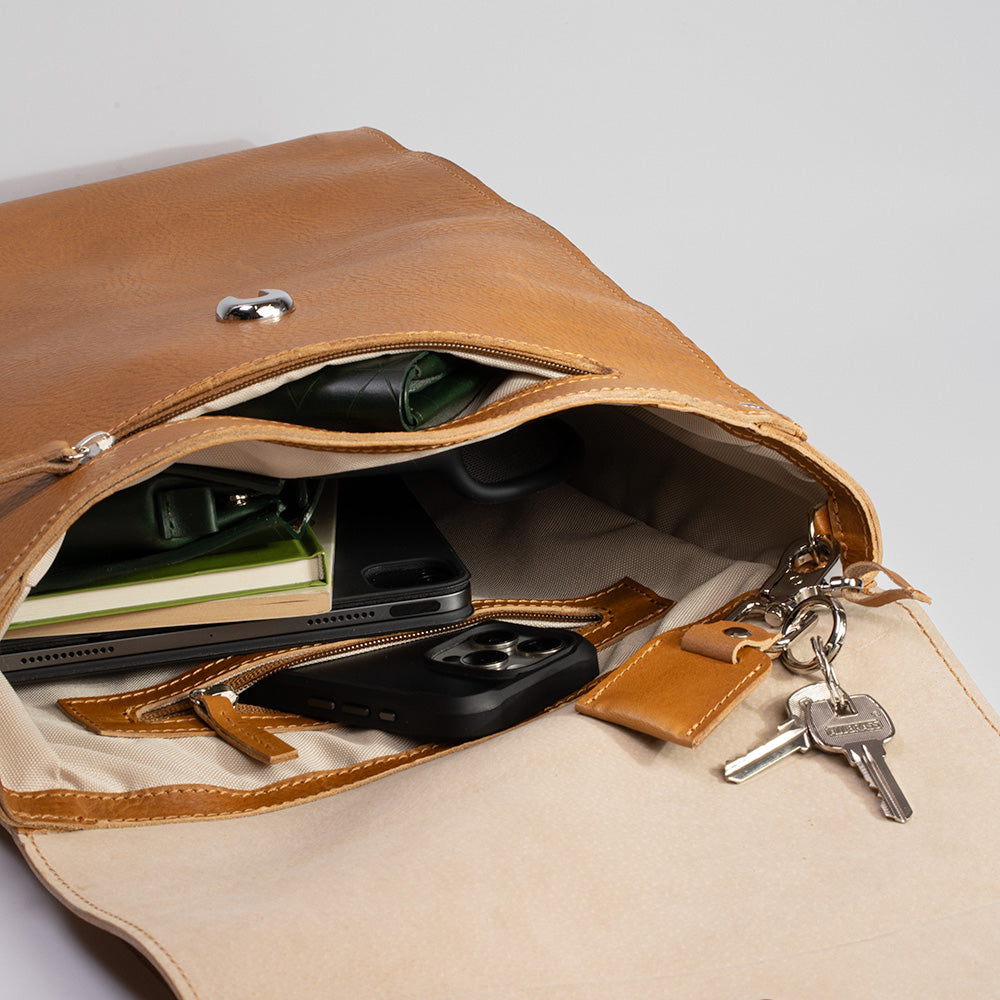 interior of leather backpack minimalist with macbook compartment