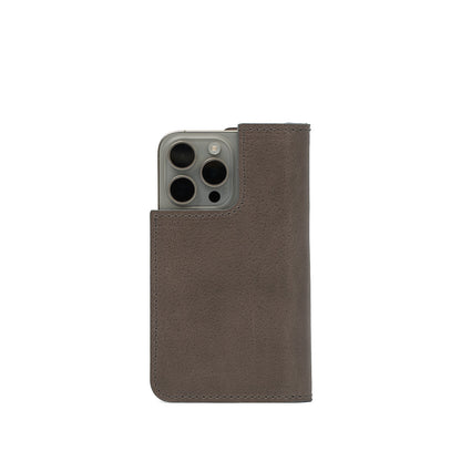 Gray iPhone 16 folio case with folding design, The Minimalist 1.0, featuring integrated card slots