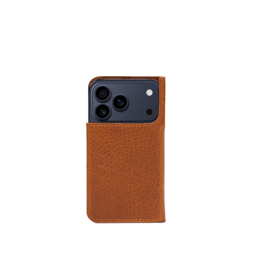 iPhone 17 Pro in tan full-grain leather folio wallet case, slim front view
