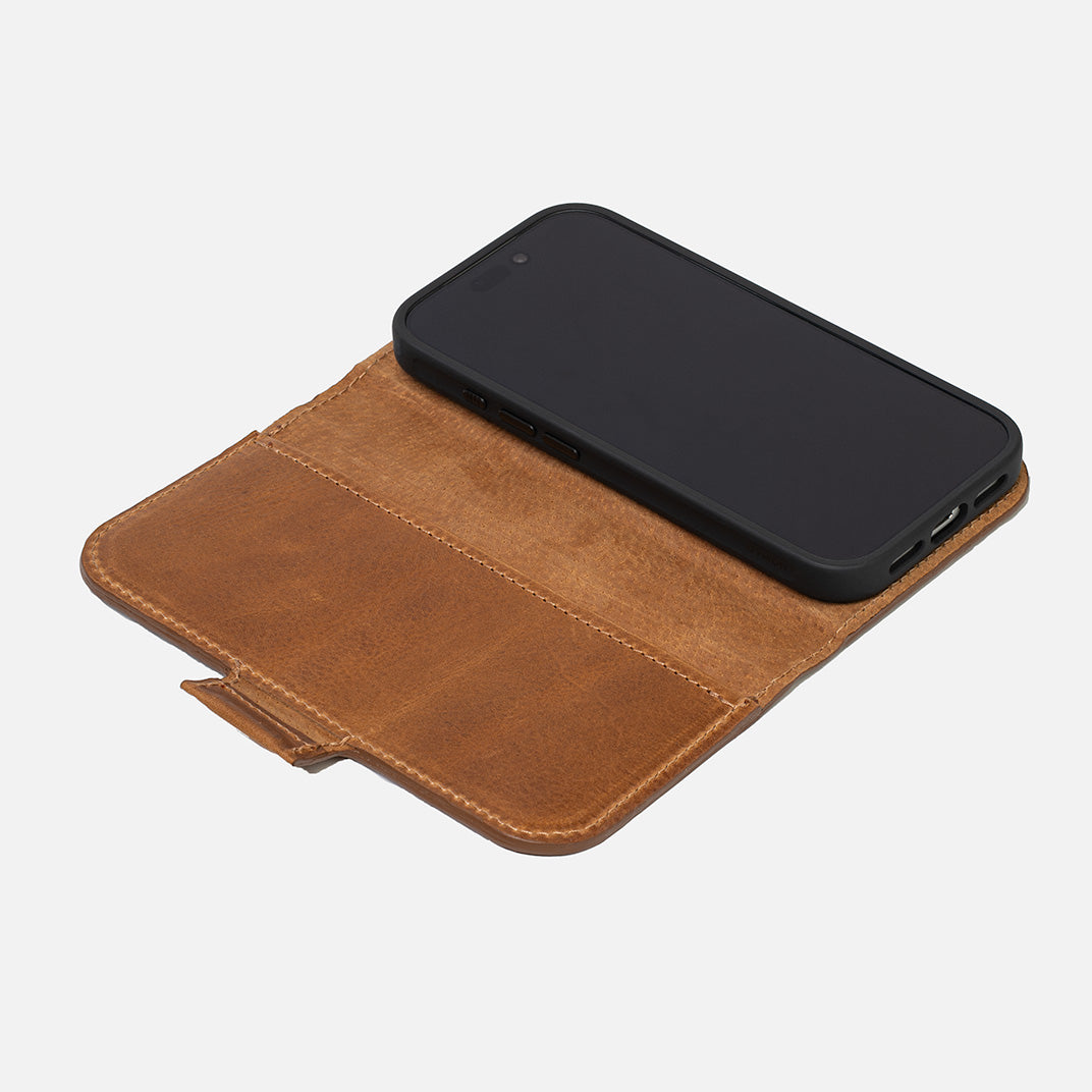 Open brown full-grain leather iPhone 17 folio wallet, Minimal layout; phone right, bill pocket and tab – Geometric Goods
