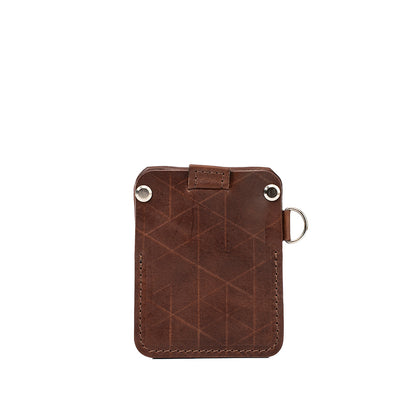 Mahogany leather AirTag wallet by Geometric Goods with geometric pattern, D-ring, and rear card slot
