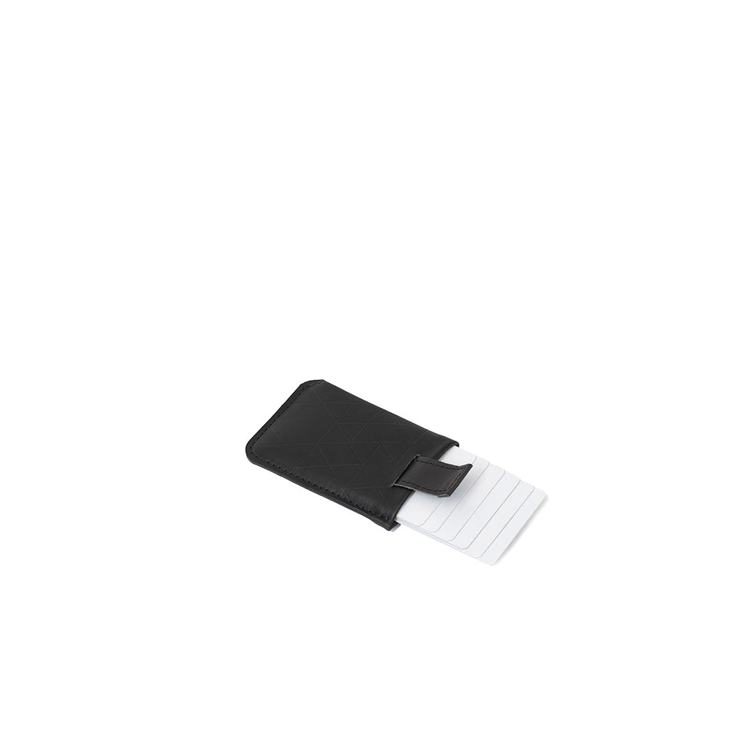 Black leather card holder wallet with pull-tab slider – shown with multiple cards