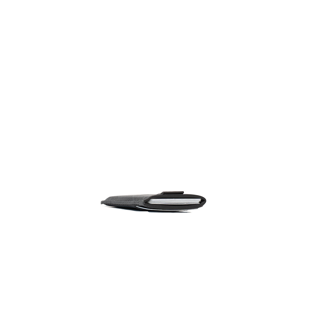 Slim profile of black leather RFID card wallet – side view fully loaded with cards