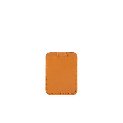 Designer orange leather cardholder, slim and minimalist style with precise stitching, perfect for carrying credit cards