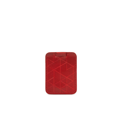 Designer red leather cardholder featuring a distinctive geometric pattern and detailed stitching