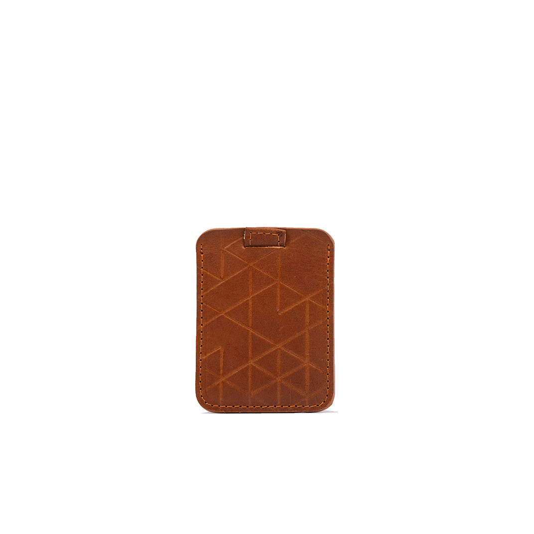 Designer leather cardholder in tan el with a geometric pattern, minimalist design, and multiple credit card slots