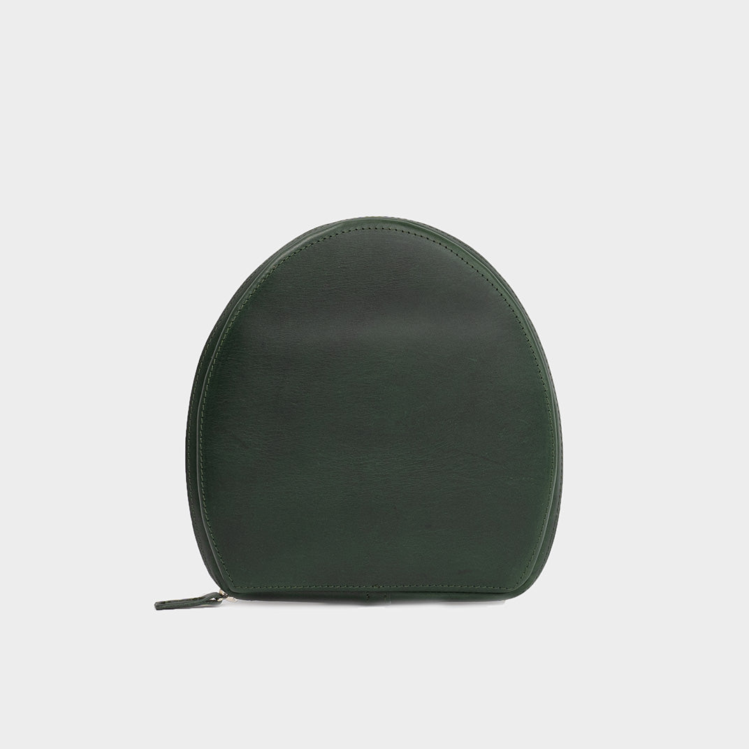 Front view of a forest green leather case for AirPods Max, highlighting its smooth finish and elegant shape.