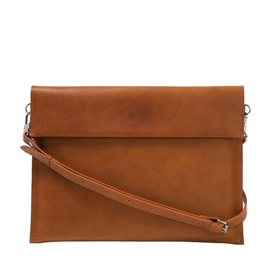 Elegant man sleeve case bag for MacBook 15 in cognac brown tan color with adjustable strap made from premium Italian leather