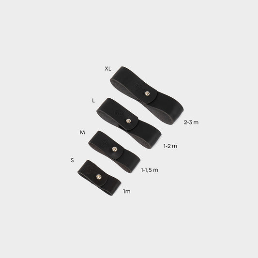 Size chart of leather cable organizers in small, medium, large, and extra large for 1 to 3 meter cords