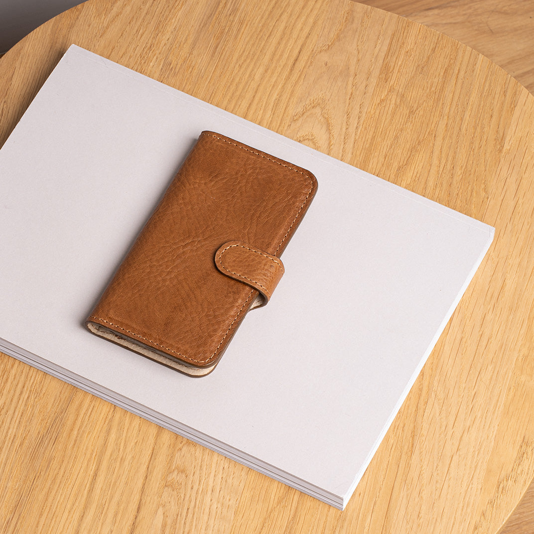 premium flip folio case for iPhone 16 pro in brown color