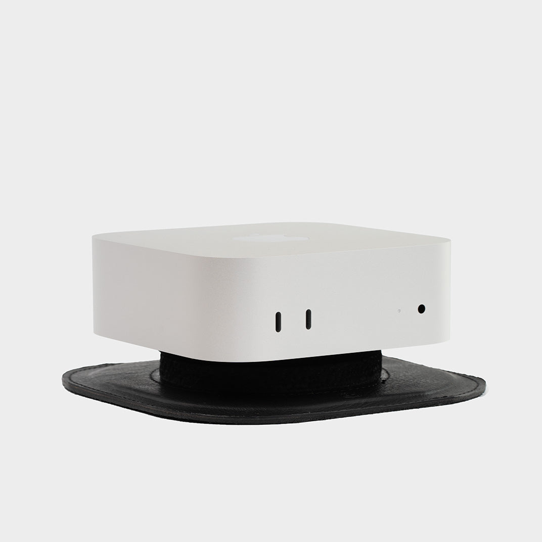 High-quality black leather Mac Mini M4 stand, combining designer aesthetics with practical use for a Mac Mini setup