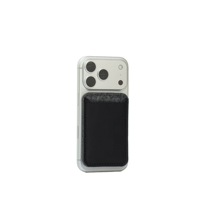 Black leather and gray Merino wool felt wallet compatible with MagSafe on an iPhone