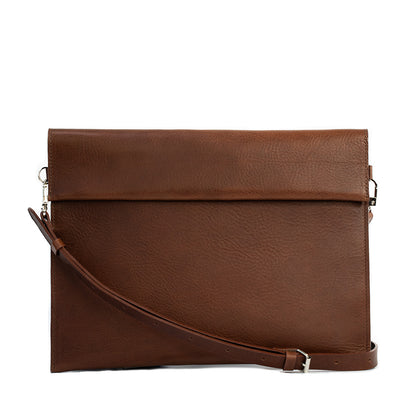 elegant leather bag for MacBook with adjustable strap made from premium Italian leather in mahogany color