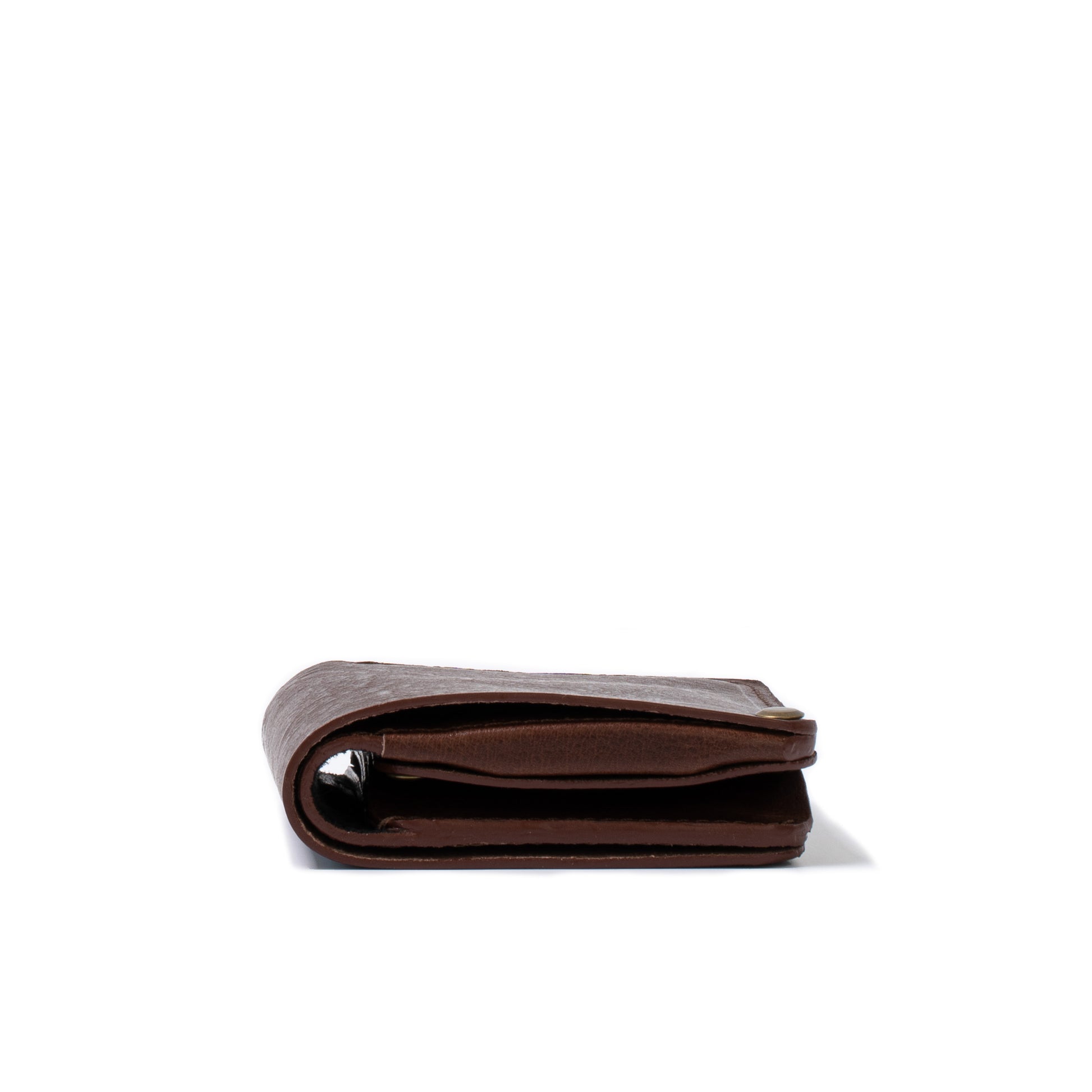 Premium AirTag wallet with large coin punch for men and women made by Geometric Goods from superior Italian Leather in dark brown color