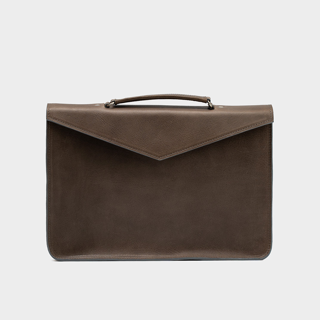 Sleek professional gray leather briefcase with a smooth texture and precise stitching, featuring a comfortable handle and a structured design, ideal for business use