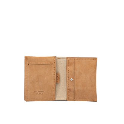 Open view of velour sand leather AirTag card wallet displaying card slots and secure pocket.