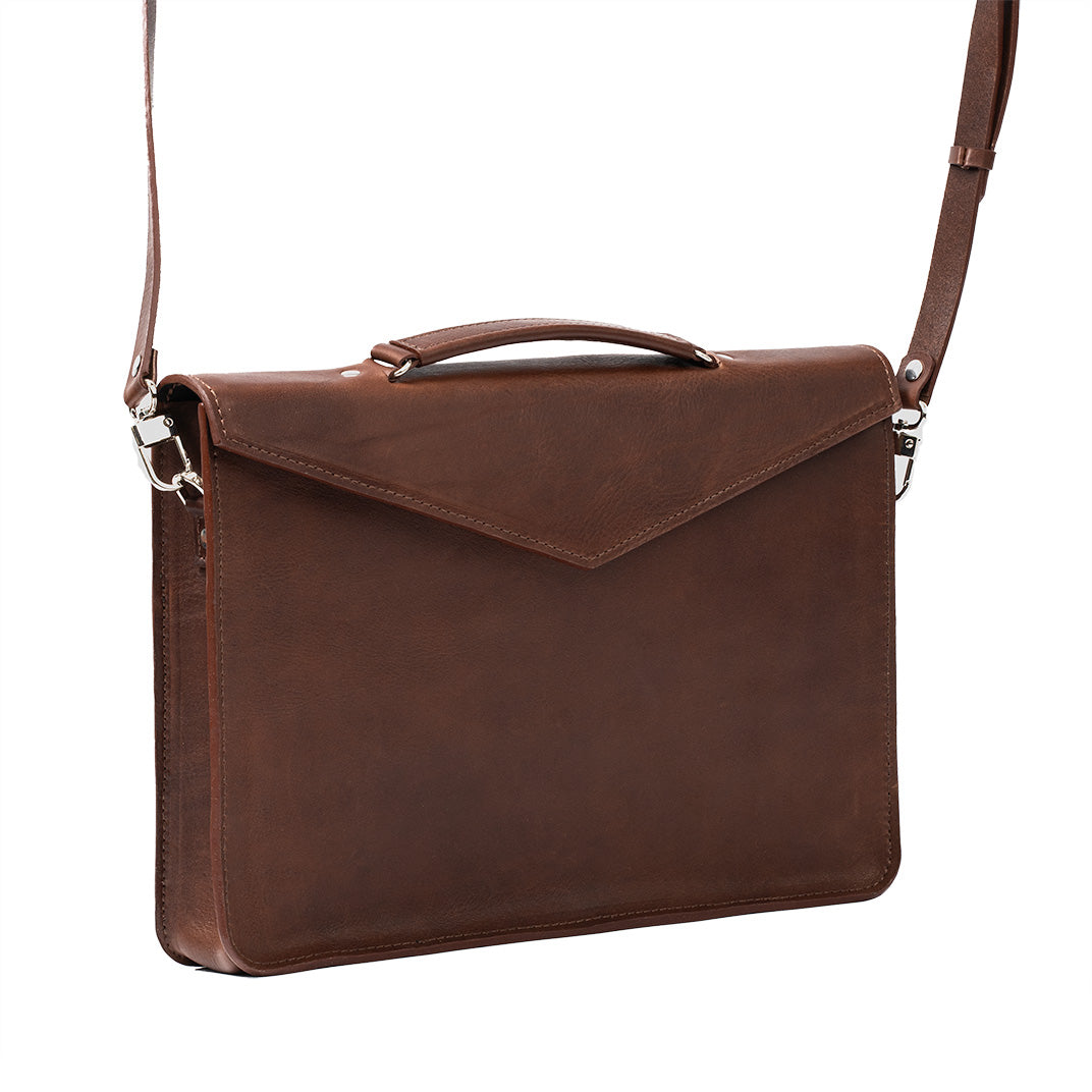 Luxurious mahogany leather ladies briefcase, versatile as a laptop ladies bag with sophisticated multi-pocket design for business essentials.