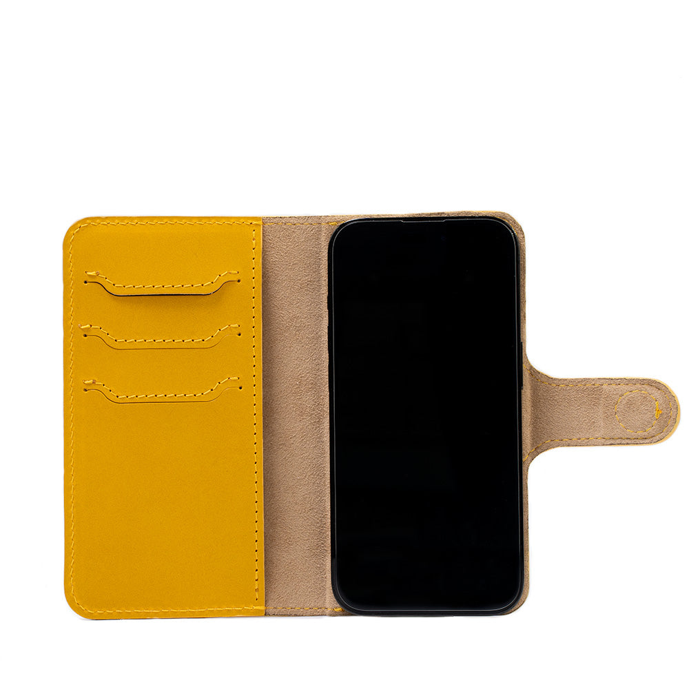 photo of top-rated MagSafe Folio Case with grip for iPhone made Geometric Goods from premium eco-frienly top-grain leather in yellow color 