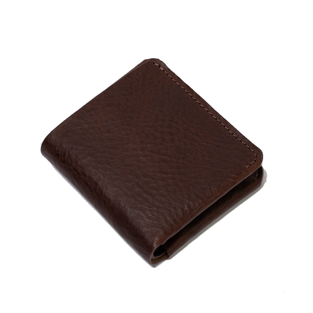 folded brown leather AirTag billfold wallet made by Geometric Goods from premium Italian leather
