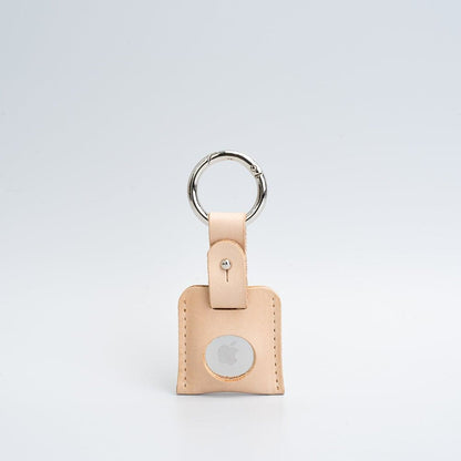 beige leather airtag keyring with silver carabiner