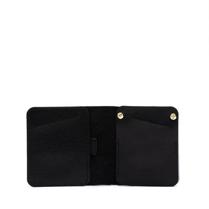 black bilfold airtag wallet with golden rivets