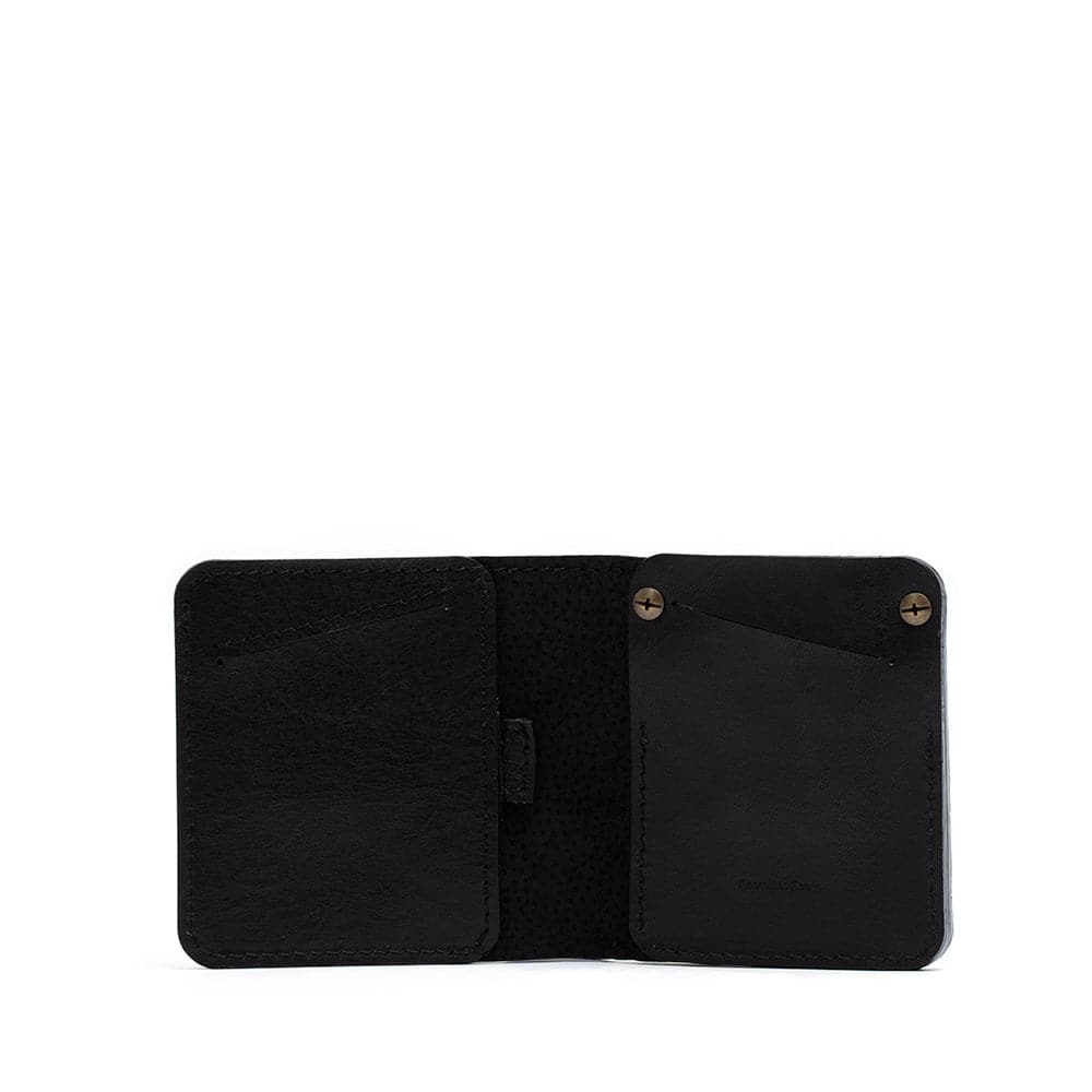 black airtag wallet with antique brass rivets