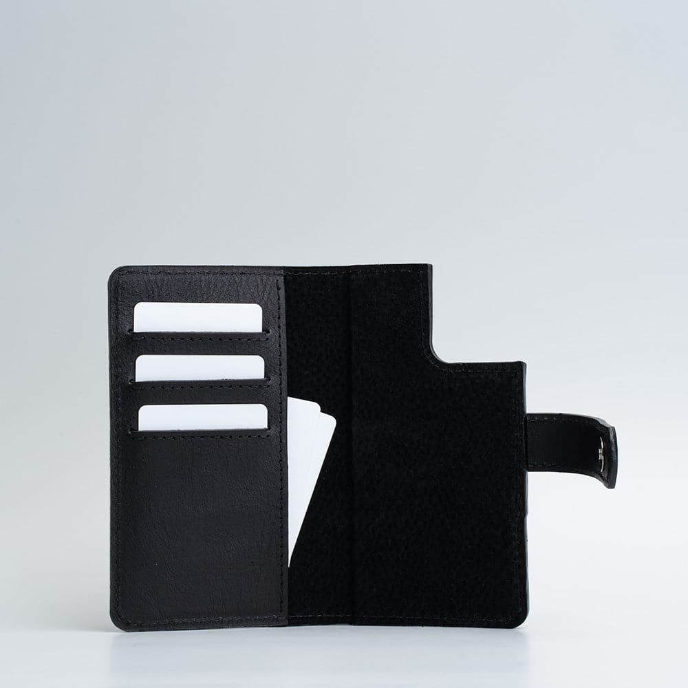 black iPhone 12 pro folio wallet
