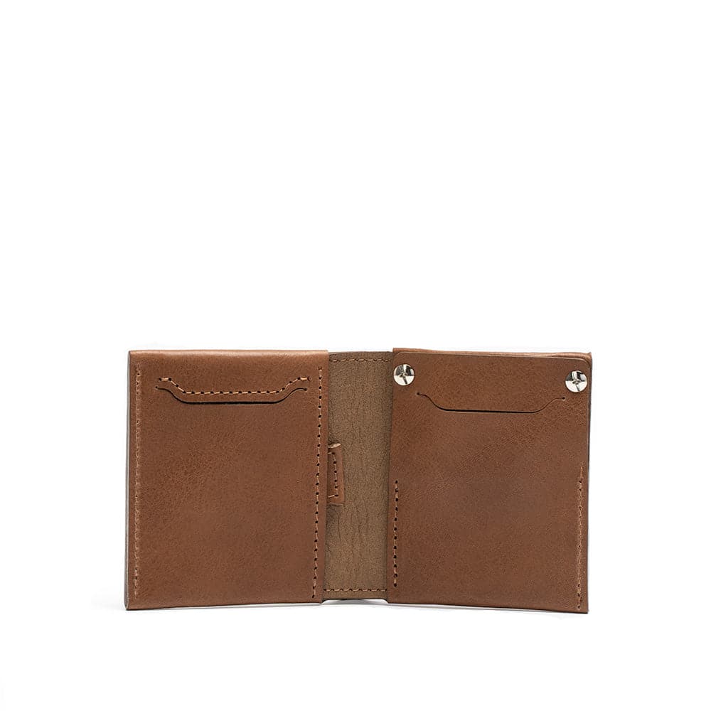brown leather wallet hold paper bills, cards and airtag