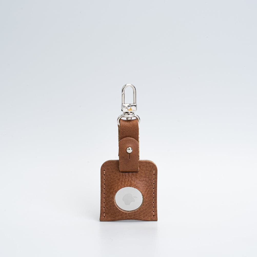 brown bag charm airtag