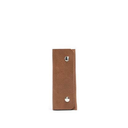 brown color leather air tag key holder made by Geometric Goods