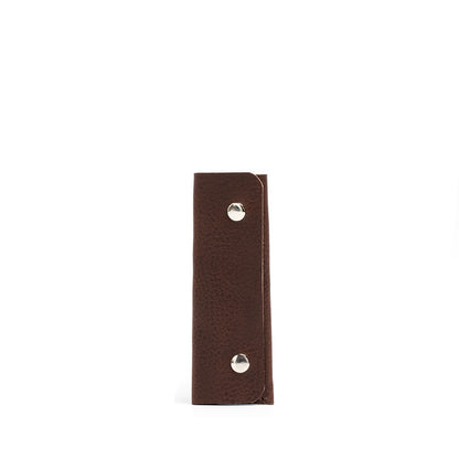 leather airtag keychain case in mahogany color
