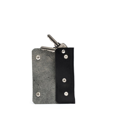 leather airtag key holders in black color made from premium leather