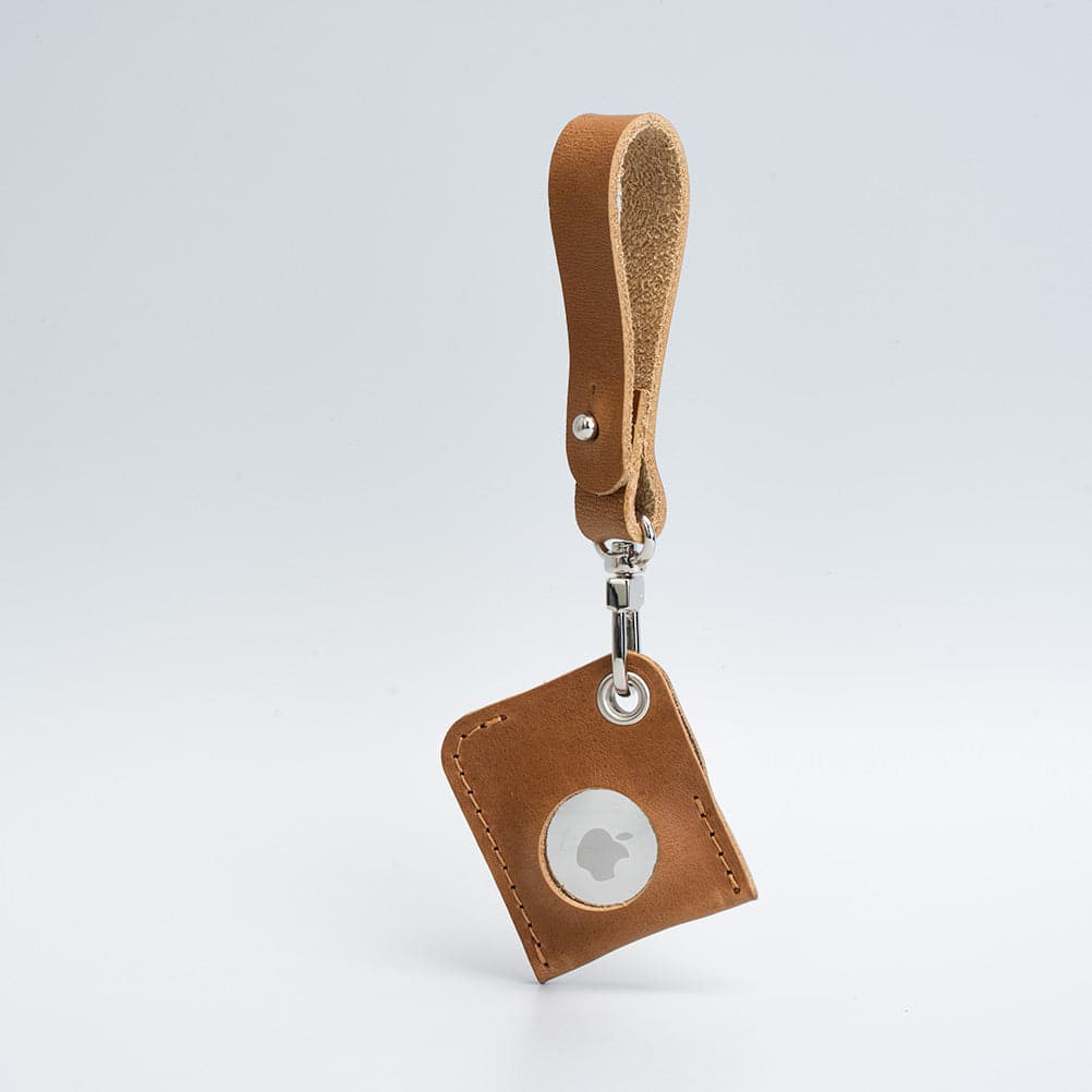 light brown leather airtag bag charm