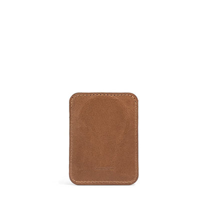 Brown leather MagSafe wallet for iPhone, designed to securely hold up to 6 cards, made from premium full-grain leather