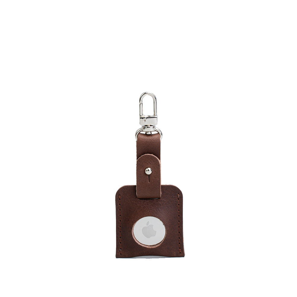 mahogany bag charm with carabiner airtag