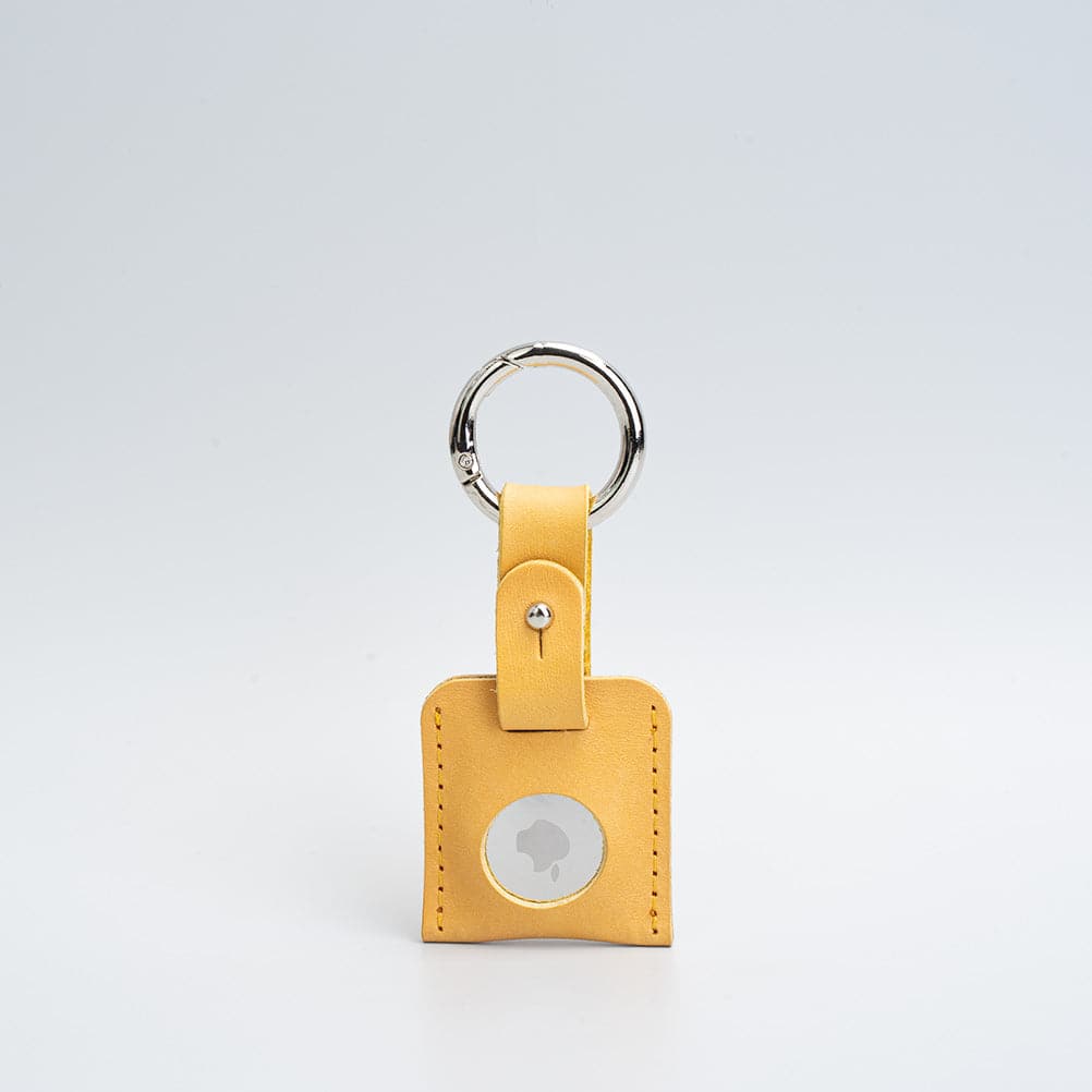 mustard yellow leather airtag keyring with carabiner